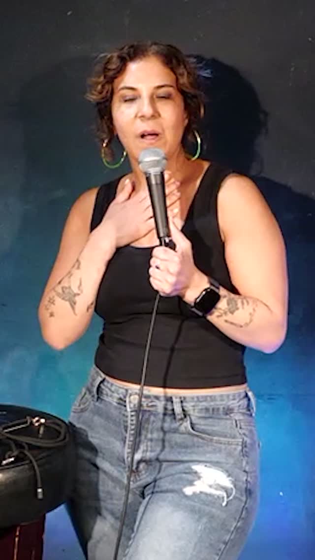 Maria Shehata performing comedy